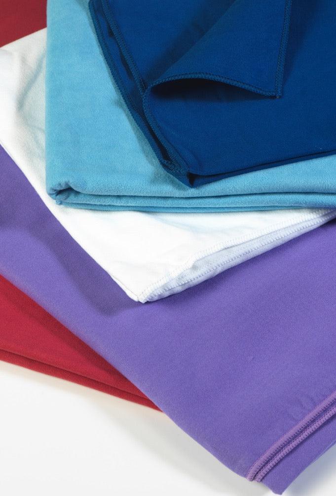 All Colours of Microfibre Sports/Beach Suede Towels laid out flat